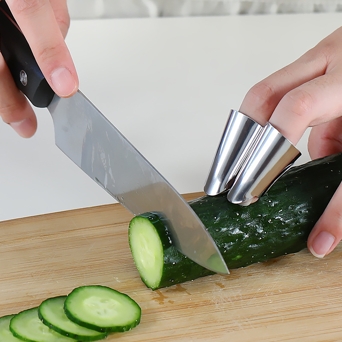 ステンレス鋼フィンガーガード指ハンドカットハンドプロテクター - Kitchen Gadgets Cool のレビューと価格