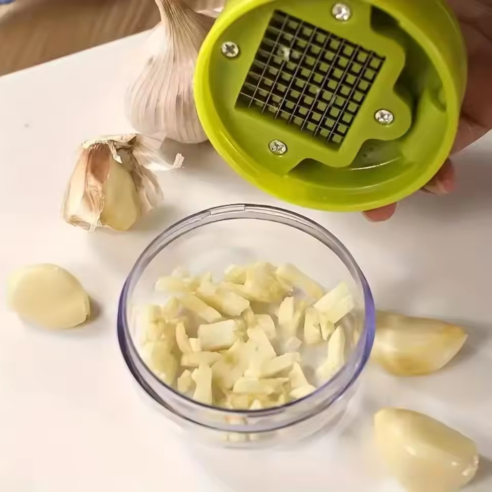 ガーリックプレスチョッパー 手動ガーリックミンサー スライサ - Kitchen Gadgets Vegetable Cutter のレビューと価格